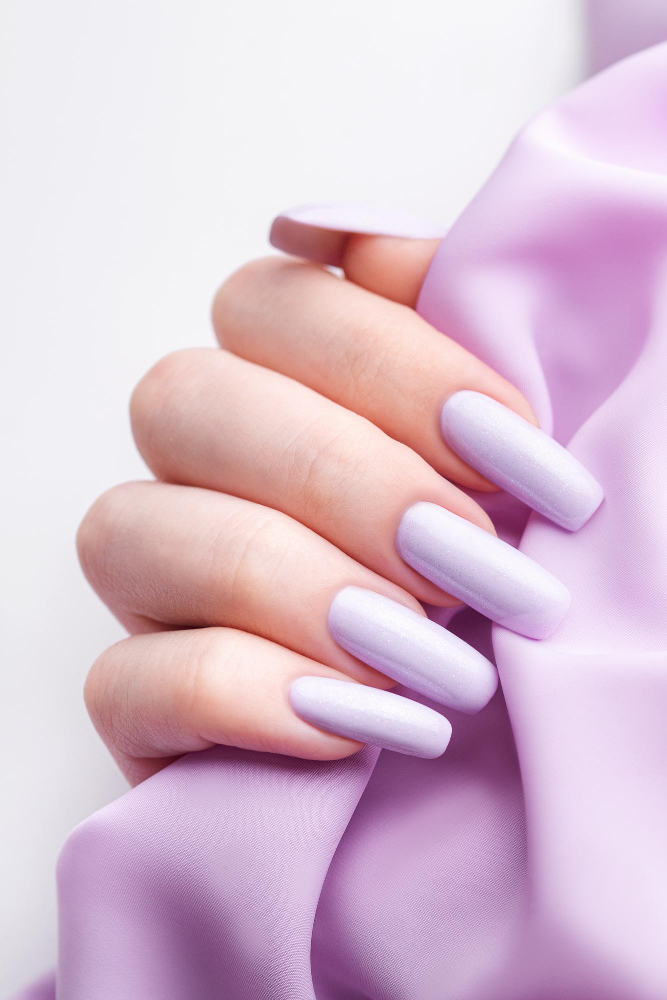 girl-s-hands-with-soft-purple-manicure